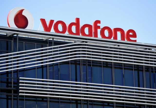Vodafone says annual earnings will be at the low end of forecasts due to difficulties in I