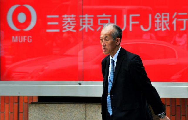 Japan's MUFG booked a net profit of 786.9 billion yen ($7.0 billion) for April-December, d