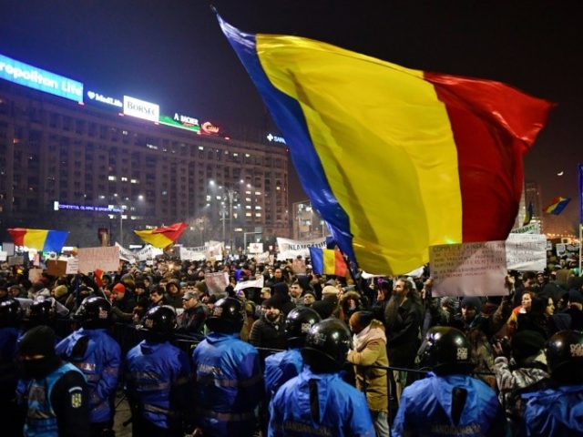 Romanian riot police during a demonstration against controversial decrees to pardon corrup