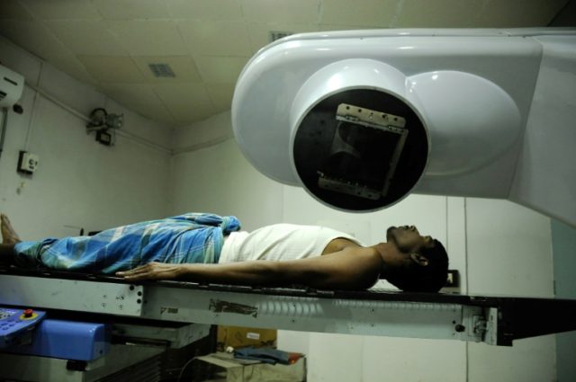 A cancer patient receives radiation treatment at hospital in Agartala, India, on February