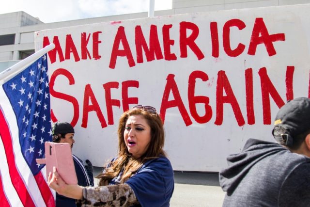 Demonstrators rally at Los Angeles International Airport in support of an executive order