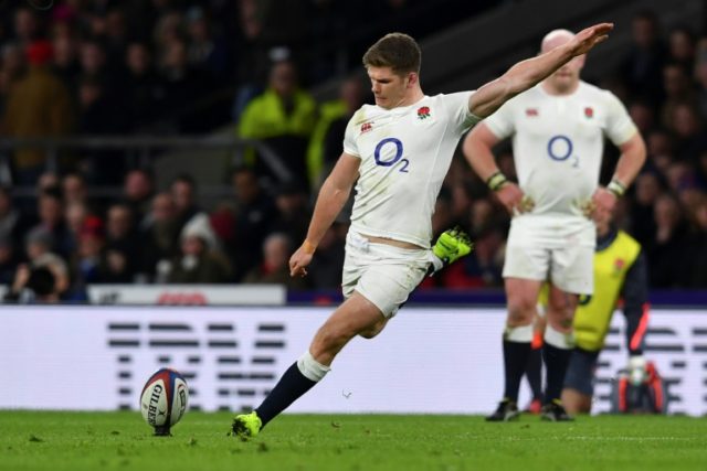 England's centre Owen Farrell scores from a penalty kick during their Six Nations rugby un