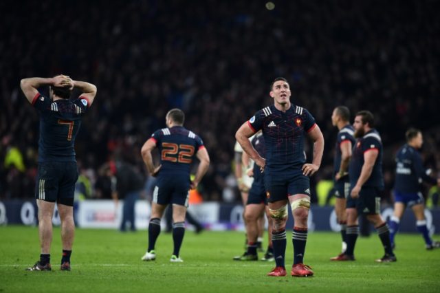 France's Louis Picamoles (R) reacts at the full-time whistle during their Six Nations matc