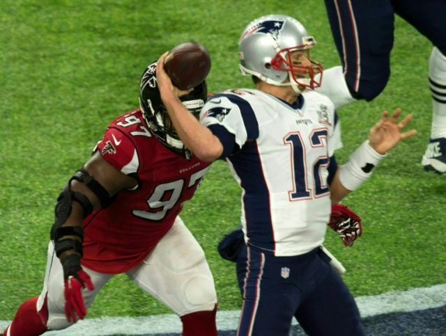 Tom Brady of the New England Patriots throws a pass against the Atlanta Falcons during Sup