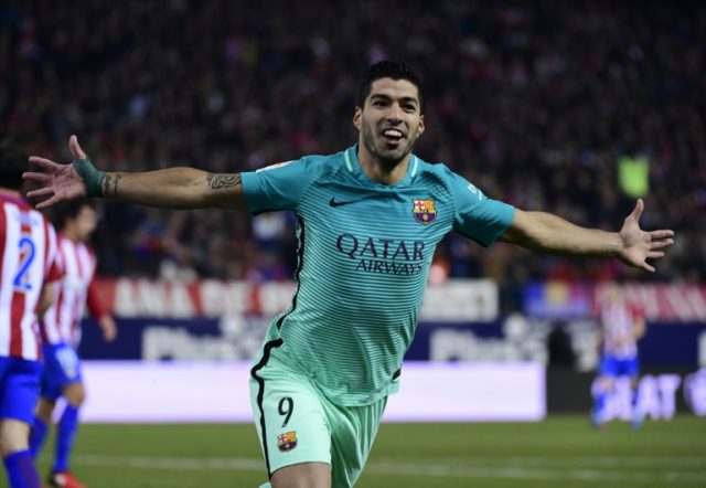 Luis Saurez's goal helps Barcelona to a 2-1 lead over Atletico Madrid in their Copa del Re