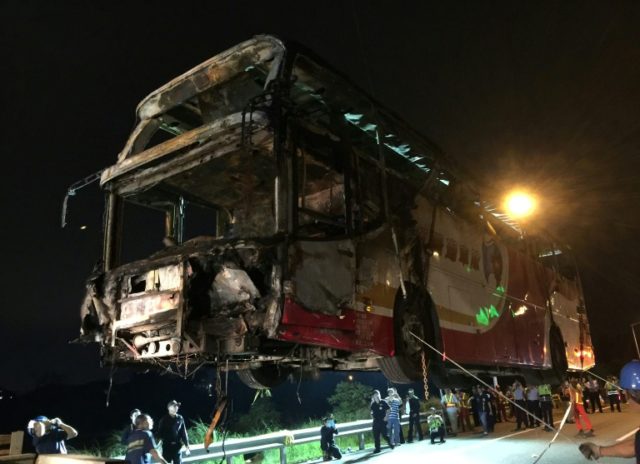 A bus is recovered after an incident in Taoyuan in July 2016