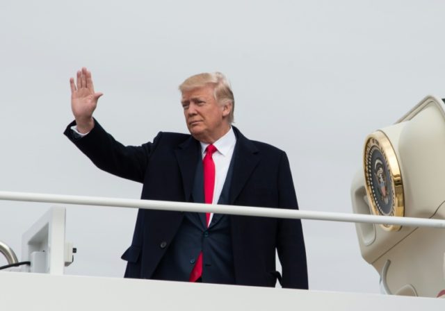 US President Donald Trump boards Air Force One at Andrews Air Force Base in Maryland on Fe