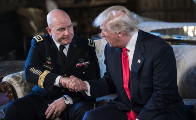 US President Donald Trump shakes hands with H.R. McMaster (L) as his national security adv