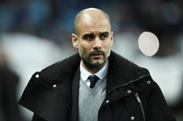 Manchester City's manager Pep Guardiola arrives for the Champions League football match ag