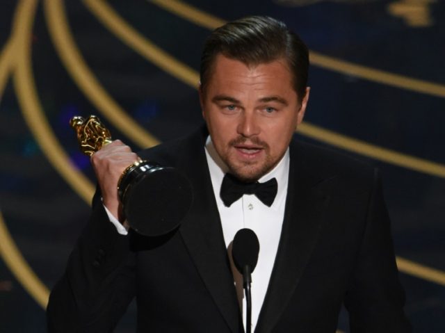 Leonardo DiCaprio accepts the award for Best Actor, in 'The Revenant', during the 88th Osc