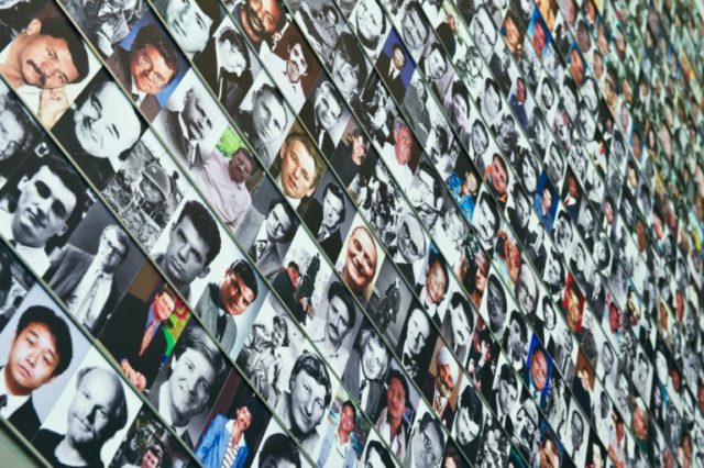 Faces of fallen journalists are seen on the Newseum's Journalists Memorial in Washington,