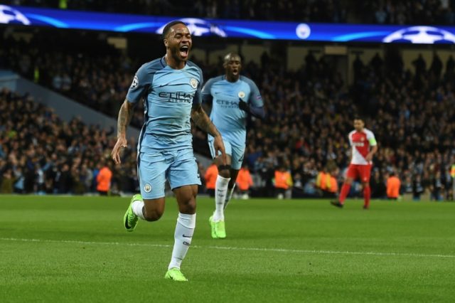 Manchester City's midfielder Raheem Sterling celebrates scoring the opening goal during th