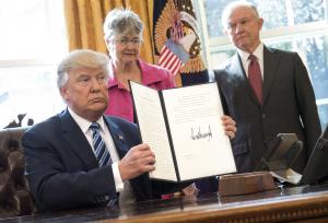 Trump signs three executive orders to 'restore safety in America'