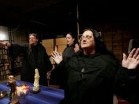 HOOPESTON, IL - OCTOBER 25: Wicca religion practitioners Rev. Don Lewis (L), Rev. Krystal High-Correll (C), and Rev. Virgina Powell HPS, participate in a Wiccan Lunar ritual in the temple at the Witch School October 25, 2006 in Hoopeston, Illinois. Wicca is a neo-Pagan religion which uses magic and nature …