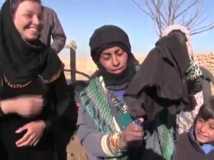 Video: Women Freed from Islamic State Burn Face Veils, Smoke Cigarettes