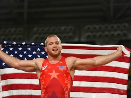 Kyle Frederick Snyder of the United States celebrates after winning gold over Khetag Goziumov (not pictured) of Azerbaijan in the Men's Freestyle 97kg on Day 16 of the Rio 2016 Olympic Games at Carioca Arena 2 on August 21, 2016 in Rio de Janeiro, Brazil. (Photo by Laurence Griffiths/Getty Images)