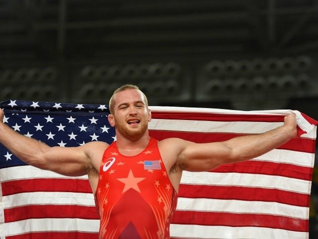 Kyle Frederick Snyder of the United States celebrates after winning gold over Khetag Goziu