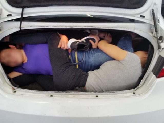 17021 -- Chinese citizens in trunk blur