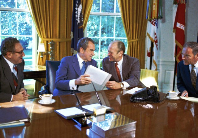 From left: Henry Kissinger, President Richard Nixon, Vice President Gerald Ford are pictur
