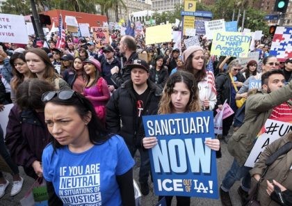 Thousands of people take part in the ``Free the People Immigration March,'' to protest actions taken by President Donald Trump and his administration, in Los Angeles Sunday, Feb. 18, 2017. March and rally organizers are calling for an end to ICE raids and deportations, minority killings by police and that …