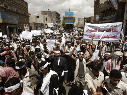 In this April 23, 2012, file photo Yemeni members of the Peaceful Revolution Salvation Front chant slogans during a demonstration demanding independence of the judicial system from government control in Sanaa, Yemen. Yemen's al-Qaida of the Arabian Peninsula (AQAP) is becoming a major draw for foreign fighters as it carves …
