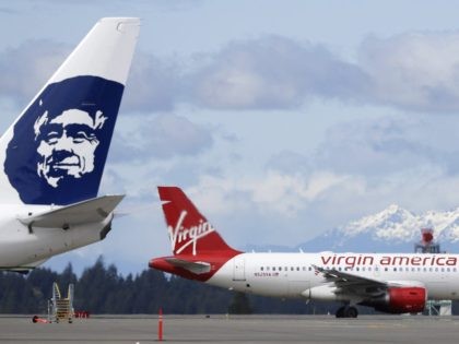 Alaska Airlines and Virgin America (Ted S. Warren / Associated Press)