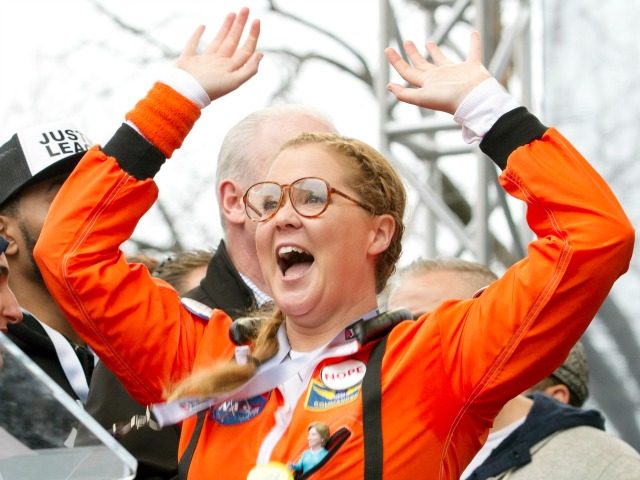 Comedian Amy Schumer speaks to the crowd during the Women's March rally, Saturday, Ja