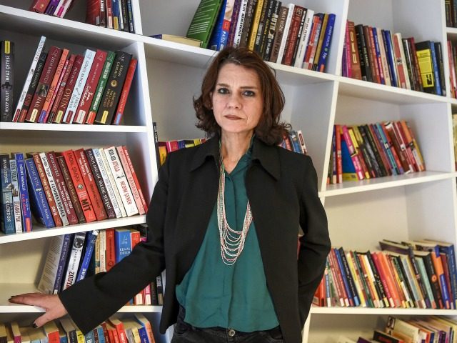 Turkish novellist Asli Erdogan poses during an interview on February 8, 2017 in Istanbul.