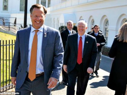 House Freedom Caucus member Rep. Dave Brat, R-Va., arrives at the White House, Thursday, March 23, 2017, in Washington. (AP Photo/Evan Vucci)
