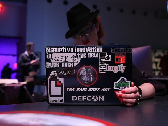 NEW YORK, NY - APRIL 15: A hacker using a laptop computer at the Hacked By Def Con Press Preview during the 2016 Tribeca Film Festival at Spring Studios on April 15, 2016 in New York City. (Photo by Rob Kim/Getty Images for Tribeca Film Festival)