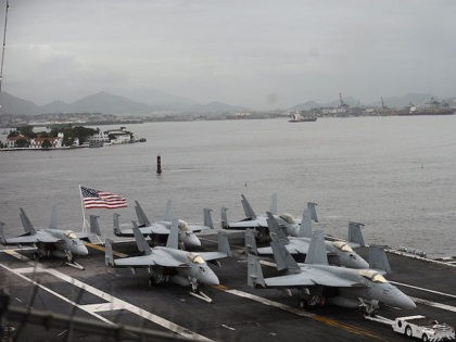 Partial view of the flight deck of the USS Carl Vinson (CVN-70) Nimitz class aircraft supercarrier, at anchor in Guanabara Bay, Rio de Janeiro, Brazil, on February 26, 2010. The Carl Vinson arrives from Haiti, where she took part in Operation Unified Response, providing military support capabilities to civil authorities …