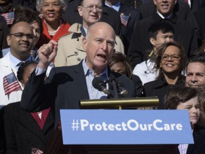 Jerry Brown Obamacare protest (Susan Walsh / Associated Press)