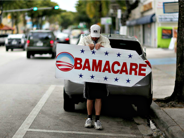 Obamacare Here Sign Joe Raedle Getty