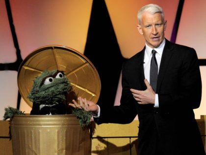 Oscar the Grouch and Anderson Cooper (Chris Pizzello / Invision / Associated Press)