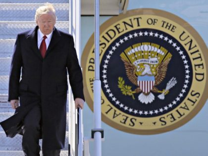 Trump Exits Plane APDuane Burleson