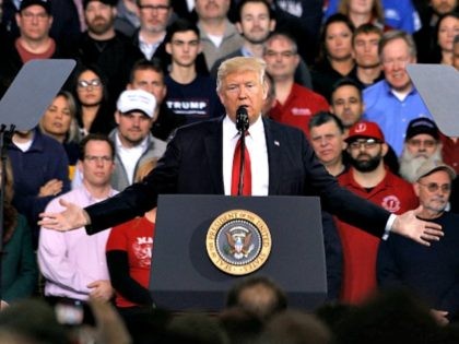 YPSILANTI, MI- MARCH 15: President Donald Trump speaks to auto workers at the American Center for Mobility March 15th, 2017 in Ypsilanti, Michigan. Trump discussed his priorities of improving conditions to bolster the manufacturing industry and reduce the outsourcing of American jobs. (Photo by Bill Pugliano/Getty Images)