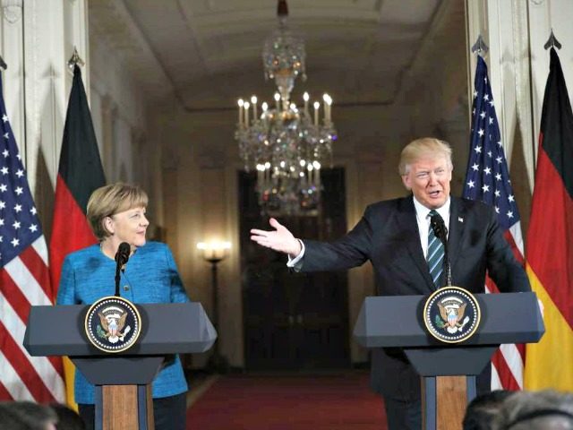 Trump and Merkel AP