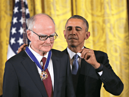 U.S. President Barack Obama (R) presents the Presidential Medal of Freedom to William Ruckelshaus (L), the first and fifth Administrator of the Environmental Protection Agency, during an East Room ceremony November 24, 2015 at the White House in Washington, DC.