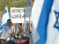 Israelis hold signs as they demonstrate against what they call an 'Apartheid Government' outside Prime Minister Ariel Sharon's offices during the weekly cabinet meeting following its decision a week ago to bar Arabs from acquiring land in Jewish communities built on state property July 14, 2002 in Jerusalem, Israel. Bowing …