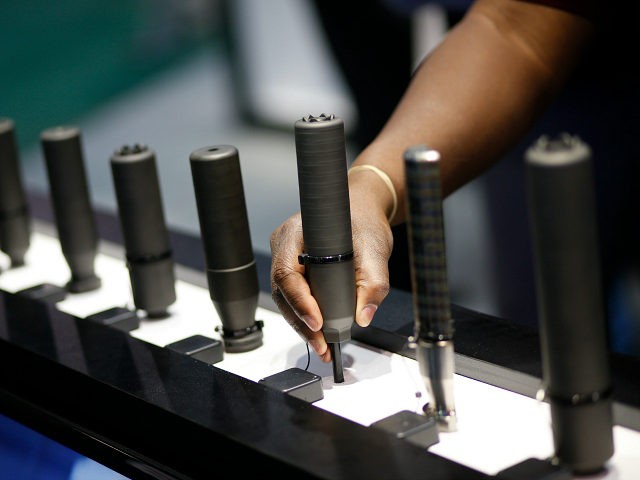 Silencers are on display at the Sig Sauer booth at the Shooting, Hunting and Outdoor Trade Show, Tuesday, Jan. 19, 2016, in Las Vegas. (AP Photo/John Locher)