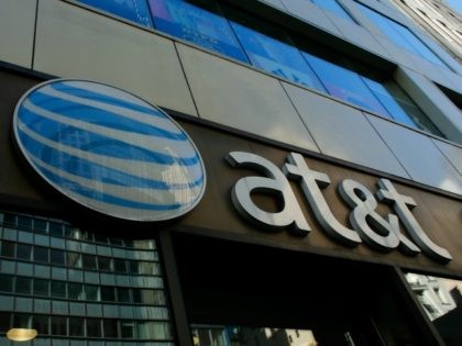 An AT&T store is seen on 5th Avenue in New York on October 23, 2016. AT&T unveiled a mega-deal for Time Warner that would transform the telecom giant into a media-entertainment powerhouse positioned for a sector facing major technology changes. The stock-and-cash deal is valued at $108.7 billion including debt, …