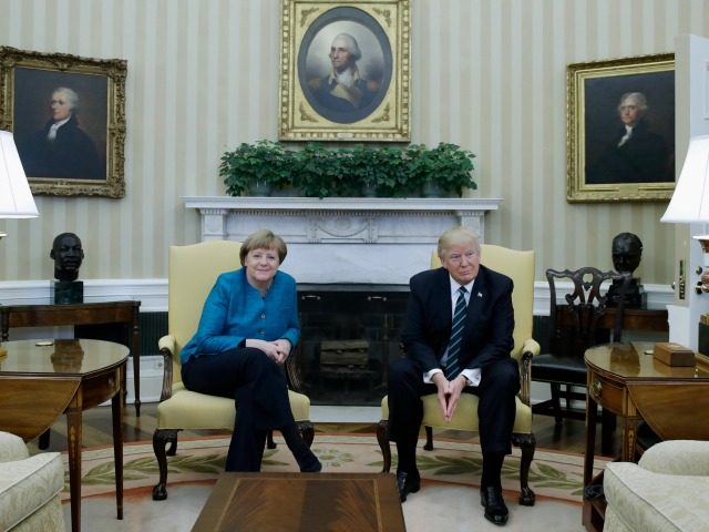 President Donald Trump xxxxx German Chancellor Angela Merkel at the White House, Friday, M