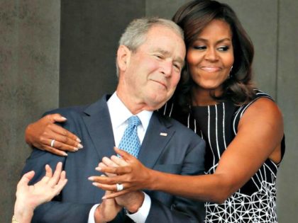 michelle-obama hugs George W Bush-AP