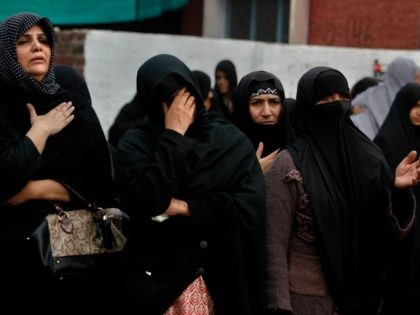 Pakistani Shiite Muslim women mourn during a procession marking Chehlum in Islamabad, Pakistan, Sunday, Nov. 20, 2016. Chehlum, traditionally marks a period of mourning for the death of Imam Hussain, grandson of Prophet Muhammad. (AP Photo/Anjum Naveed)