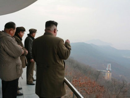 This undated picture released by North Korean official Korean Central News Agency (KCNA) on March 19, 2017 shows North Korean leader Kim Jong-Un (R) inspecting the ground jet test of a newly developed high-thrust engine at the Sohae Satellite Launching Ground in North Korea. North Korea has tested a powerful …