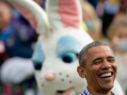 President Barack Obama, joined by the Easter Bunny, greets members of the audience on the South Lawn at the White House Easter Egg Roll at the White House in Washington, Monday, March 28, 2016. Thousands of children gathered at the White House for the annual Easter Egg Roll which features …