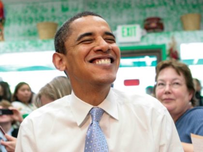 Democratic presidential hopeful, Sen. Barack Obama, D-Ill., shares a laugh with diners while having lunch at Luis's Taqueria in Woodburn, Ore., Friday, May 9, 2008. (AP Photo/Jae C. Hong)