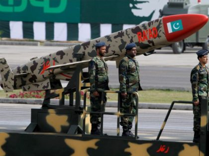A Pakistani-made Cruise missile Ra’ad is loaded on a trailer rolls down during a militar