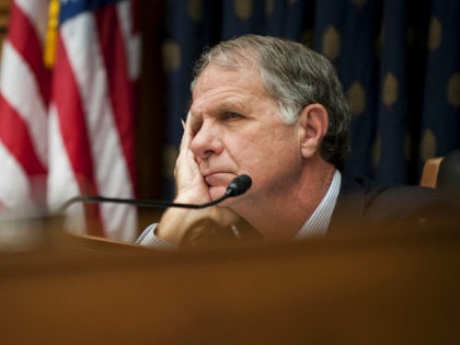 WASHINGTON, DC - December 2: Rep. Ted Poe (R-TX) listens as Robert Bradtke, senior adviser for partner engagement on Syria foreign fighters at the State Department makes an opening statement before a House Foreign Affairs SubCommittee hearing on December 2, 2014 in Washington, DC. The hearing dealt with ISIS and …