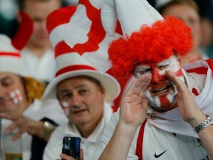 England fans wait for the start of the Rugby World Cup Pool A match between England and Wales at Twickenham Stadium, London, Saturday, Sept. 26, 2015. (AP Photo/Frank Augstein)